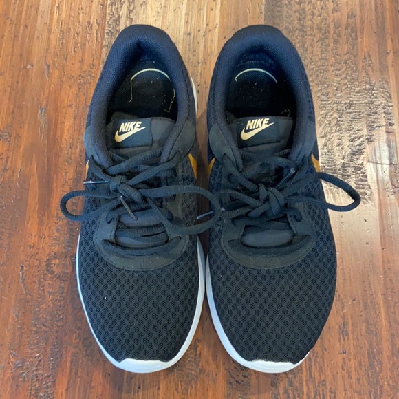 Nike Tanjun Metallic Gold.  A  Modern Design For An Elevated Everyday Look. - Picture 5 of 8